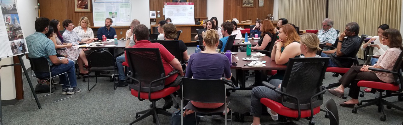 Students giving research presentations