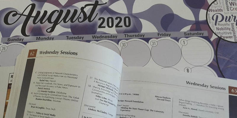 A calendar and the AEJMC conference program