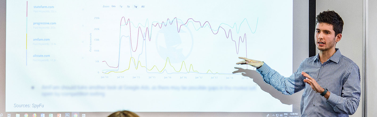A student present digital media data to a client