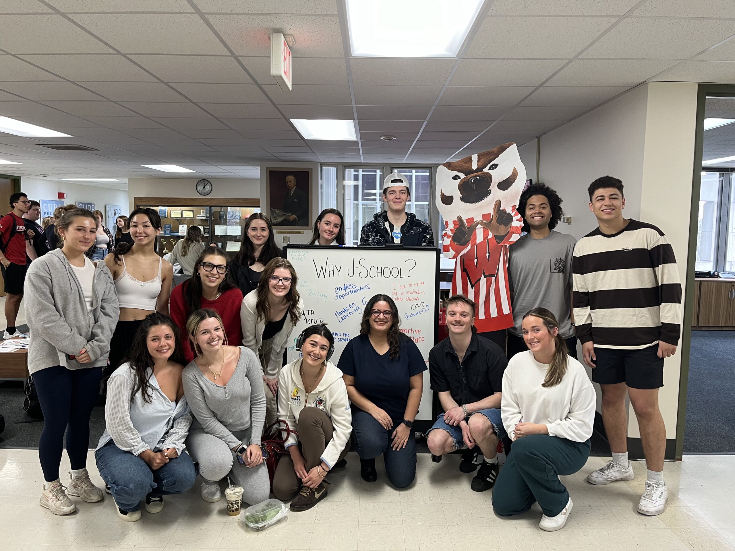 J202 lab students led by TA and PhD student Kruthika Kamath pose during a Day of the Badger celebration at Vilas Hall.