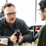 Professor Mike Wagner meets with a student
