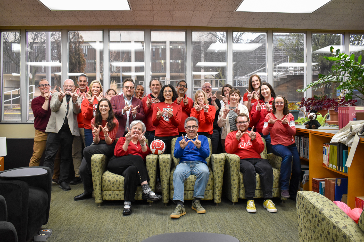 School of Journalism and Mass Communication faculty and staff celebrating Day of the Badger together.