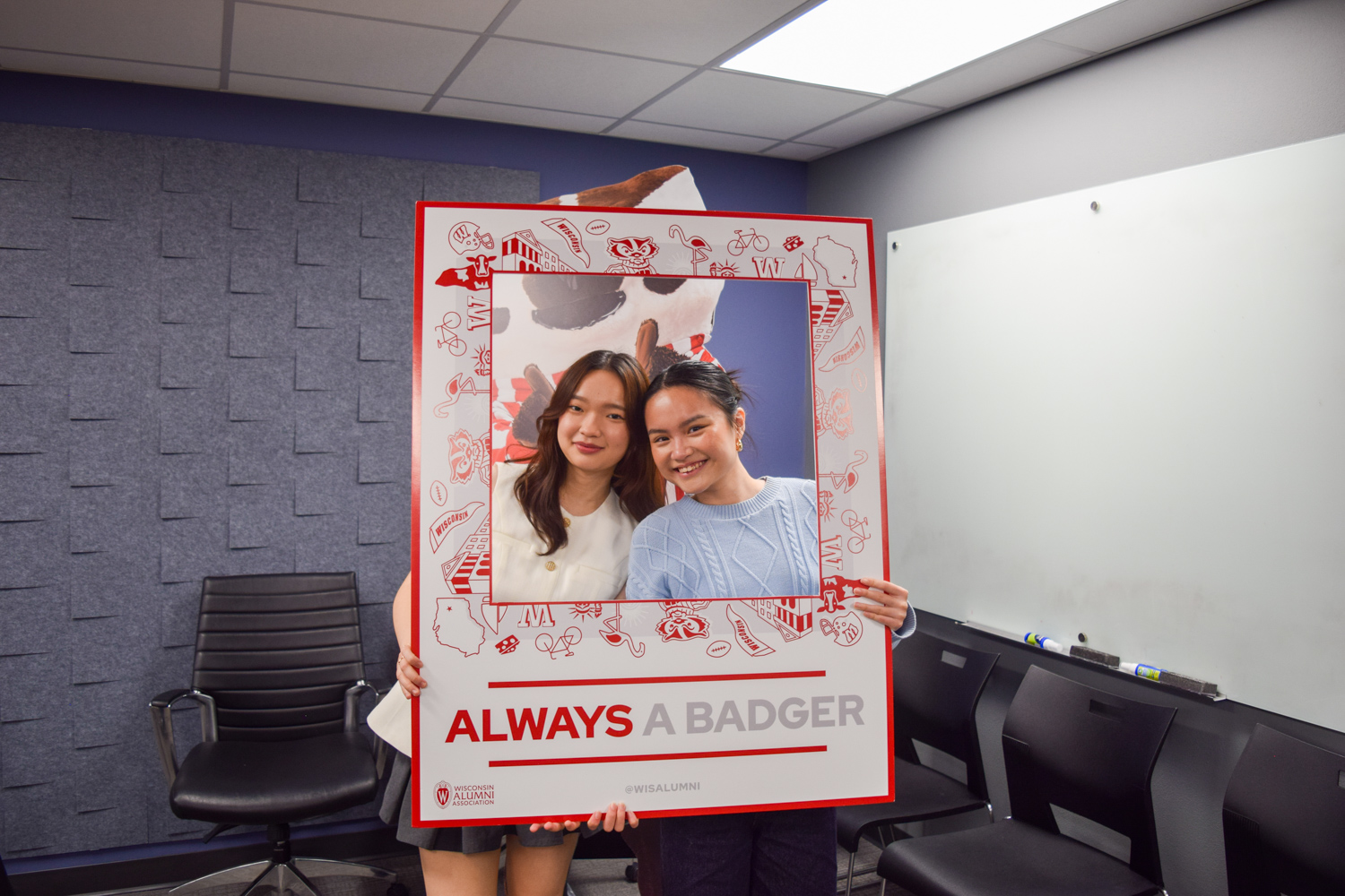 December SJMC graduates pose together at the SJMC Graduation Celebration.