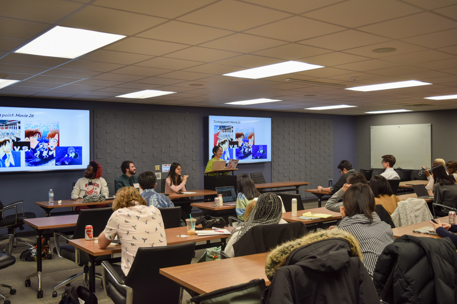 PhD student Mian (Gloria) Wei presents her research at the Communication Crossroads Conference.