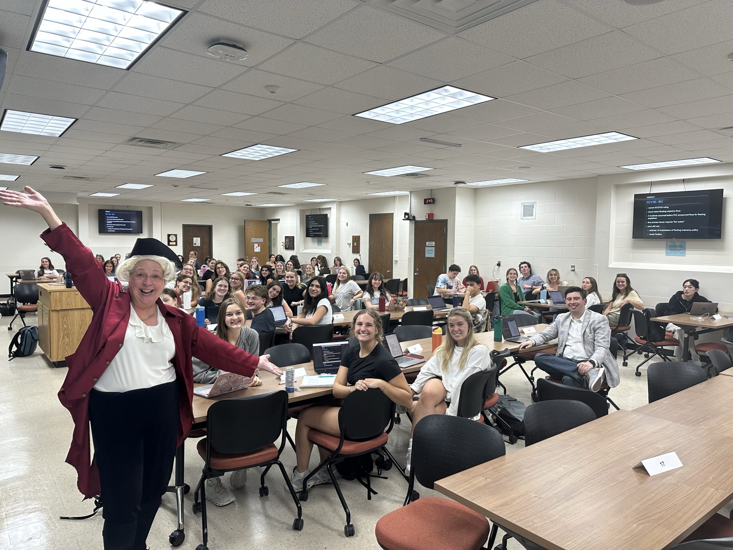 Director Katy Culver donned a founding father costume during her Law of Mass Communication class after the SJMC received a whopping 128 gifts during Fill the Hill.