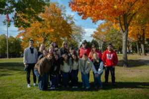 Students in professot Doug McLeod's J445 Creative Campaign Messages class pose together in a park in Sheboygan, Wisconsin.