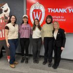 SJMC professional M.A. graduates pose with thei graduate advisors.