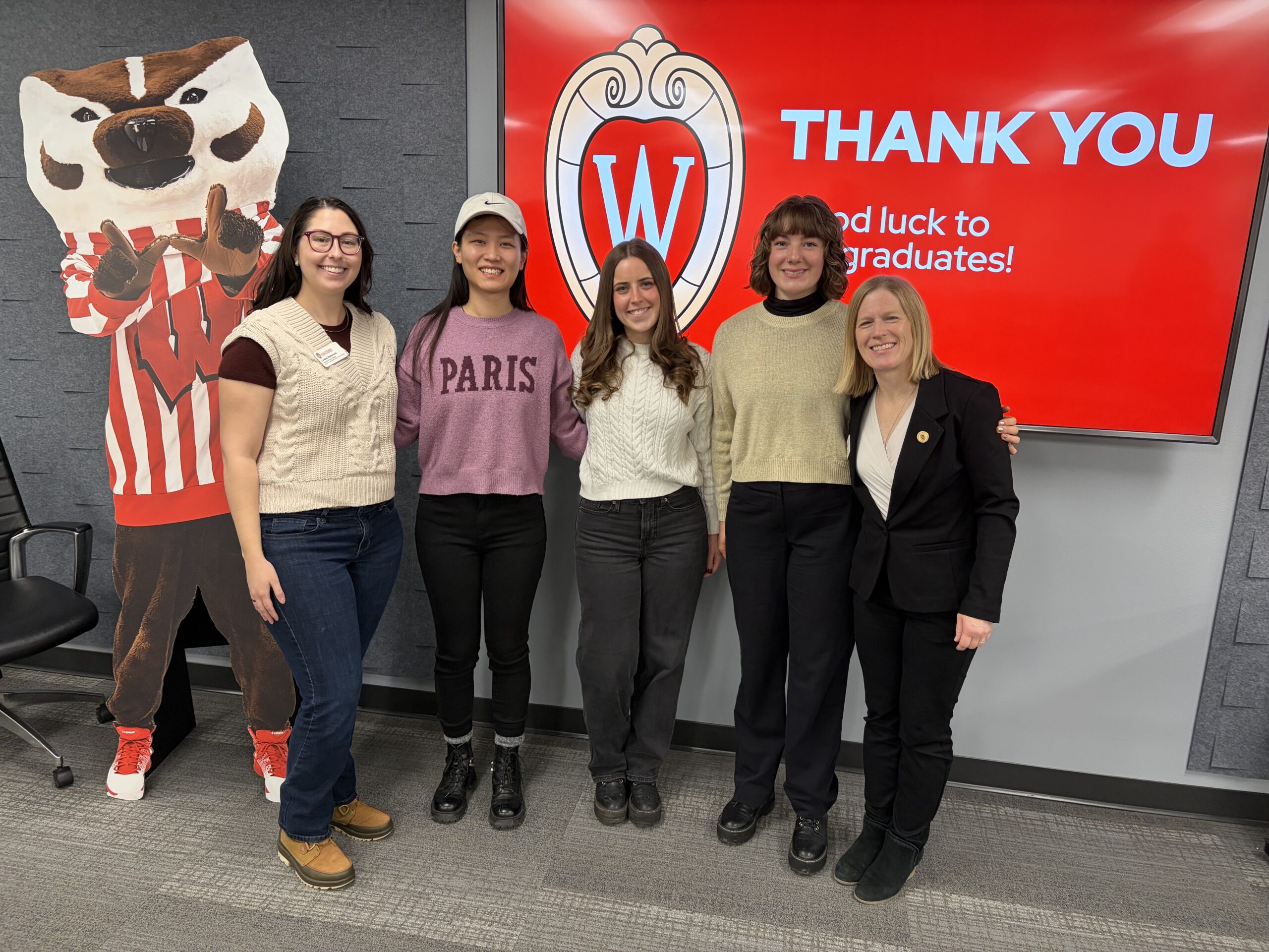 SJMC professional M.A. graduates pose with thei graduate advisors.